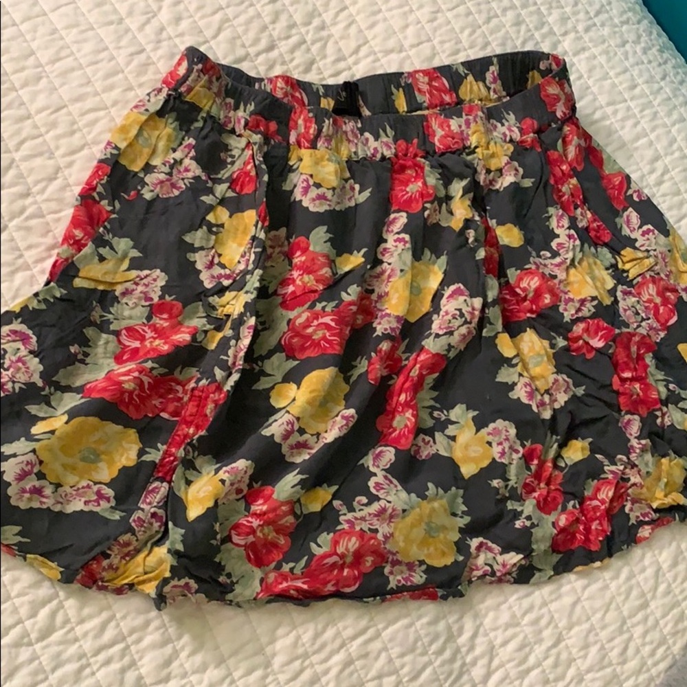 Flowery London Jean skirt with pockets.